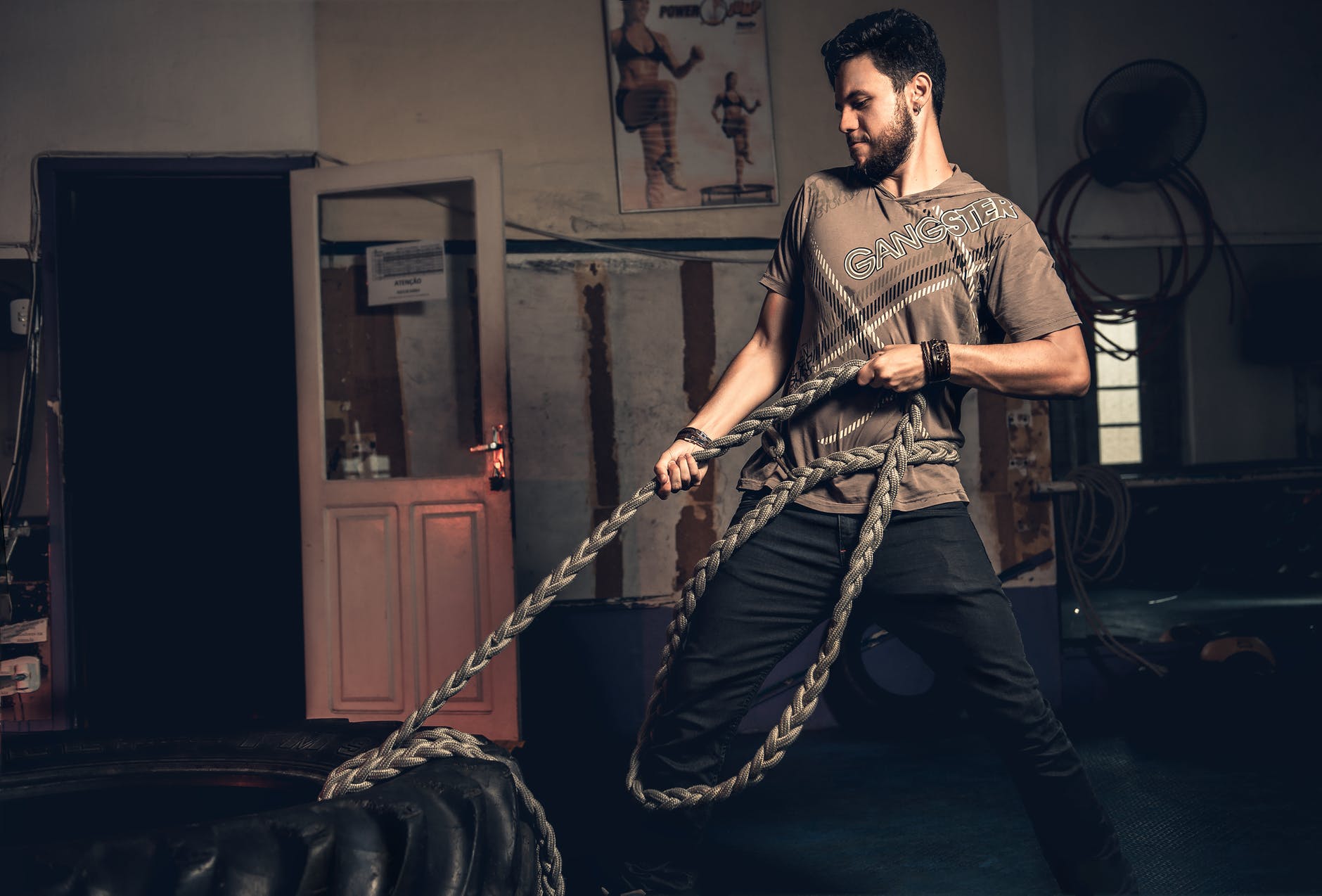 Guy pulling with ropes